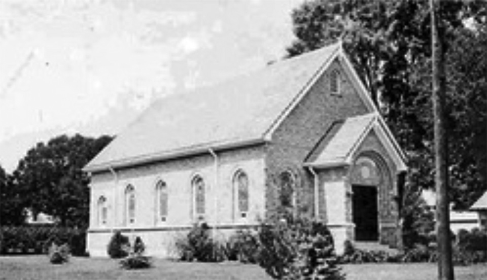 Brick Temple Emanuel synagogue on South Main Street in Opelousas, about 1930